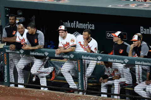 BALTIMORE, MD – JUNE 19: Members of the Baltimore Orioles look on from the dugout during the ninth inning of their 12-0 loss to the Cleveland Indians at Oriole Park at Camden Yards on June 19, 2017 in Baltimore, Maryland. (Photo by Rob Carr/Getty Images)