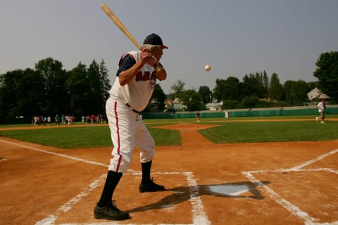 COOPERSTOWN, NY – JULY 27: Hall of Fame member Brooks Robinson hits balls to waiting fans during the Play Ball with Ozzie Smith Clinic held at Doubleday Field on July 27, 2007 in Cooperstown, New York. (Photo by Chris McGrath/Getty Images)