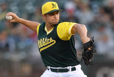 OAKLAND, CA – AUGUST 25: Kendall Graveman #49 of the Oakland Athletics pitches against the Texas Rangers in the top of the first inning at Oakland Alameda Coliseum on August 25, 2017 in Oakland, California. (Photo by Thearon W. Henderson/Getty Images)