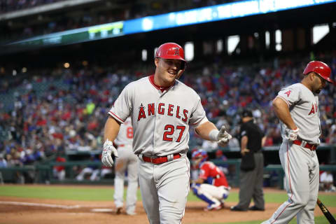 ARLINGTON, TX – APRIL 10: Mike Trout #27 of the Los Angeles Angels celebrates a homerun in the second inning against the Texas Rangers at Globe Life Park in Arlington on April 10, 2018 in Arlington, Texas. (Photo by Ronald Martinez/Getty Images)