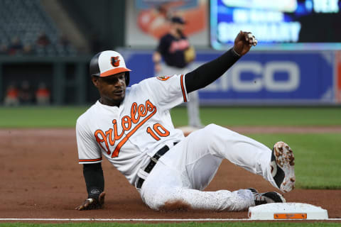 BALTIMORE, MD – APRIL 23: Adam Jones #10 of the Baltimore Orioles slides against the Cleveland Indians at Oriole Park at Camden Yards on April 23, 2018 in Baltimore, Maryland. (Photo by Patrick Smith/Getty Images)