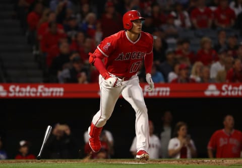 ANAHEIM, CA – APRIL 27: Shohei Ohtani #17 of the Los Angeles Angels of Anaheim watches the ball leave the park for a solo homerun on his way to first base in the second inning during the MLB game against the New York Yankees at Angel Stadium on April 27, 2018 in Anaheim, California. (Photo by Victor Decolongon/Getty Images)