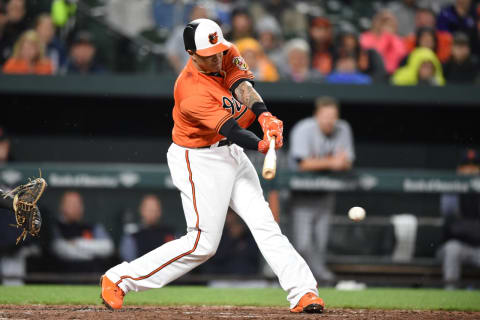 BALTIMORE, MD – APRIL 28: Manny Machado #13 of the Baltimore Orioles doubles in two runs in the seventh inning during a baseball game against the Detroit Tigers at Oriole Park at Camden Yards on April 28, 2018 in Baltimore, Maryland. (Photo by Mitchell Layton/Getty Images)