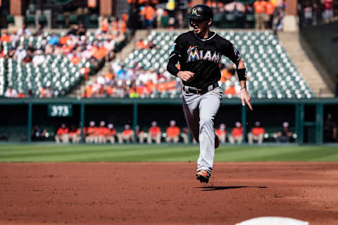 BALTIMORE, MD – JUNE 16: JT Riddle #10 of the Miami Marlins sprints to third base during the second inning against the Baltimore Orioles at Oriole Park at Camden Yards on June 16, 2018 in Baltimore, Maryland. (Photo by Scott Taetsch/Getty Images)