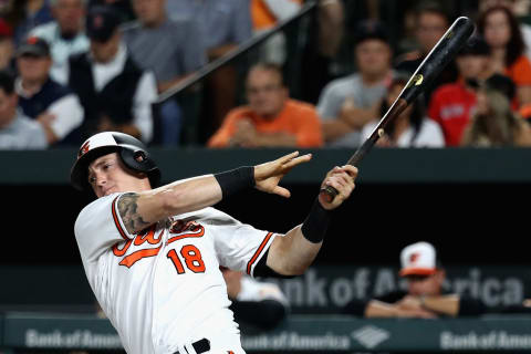 BALTIMORE, MD – SEPTEMBER 18: Austin Hays #18 of the Baltimore Orioles follows his two RBI double against the Boston Red Sox in the second inning at Oriole Park at Camden Yards on September 18, 2017 in Baltimore, Maryland. (Photo by Rob Carr/Getty Images)