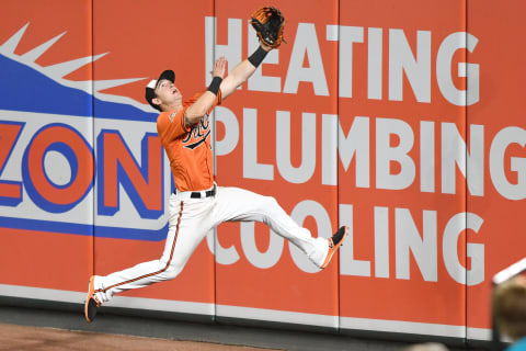 BALTIMORE, MD – SEPTEMBER 23: Austin Hays #18 of the Baltimore Orioles runs to catch a fly ball hit by Adeiny Hechavarria #11 of the Tampa Bay Rays (not pictured) in the seventh inning during a baseball game at Oriole Park at Camden Yards on September 23, 2017 in Baltimore, Maryland. (Photo by Mitchell Layton/Getty)