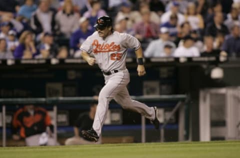 Rafael Palmeiro of the Orioles scores a run during the Baltimore Orioles at Kansas City Royals at Kauffman Stadium in Kansas City, Mo. on May 17, 2005. Baltimore won 12-8. (Photo by G. N. Lowrance/Getty Images)