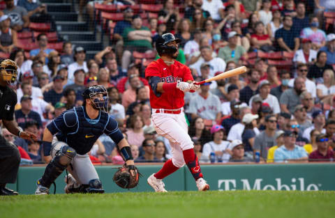 BOSTON, MA – SEPTEMBER 6: Jonathan Araúz #3 of the Boston Red Sox hits a solo home run against the Tampa Bay Rays during the seventh inning at Fenway Park on September 6, 2021 in Boston, Massachusetts. (Photo by Rich Gagnon/Getty Images)