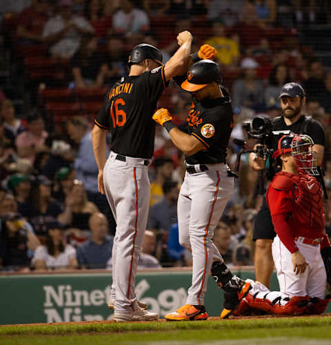 Anthony Santander #25 of the Baltimore Orioles celebrates with teammate Trey Mancini #16. (Photo by Rich Gagnon/Getty Images)