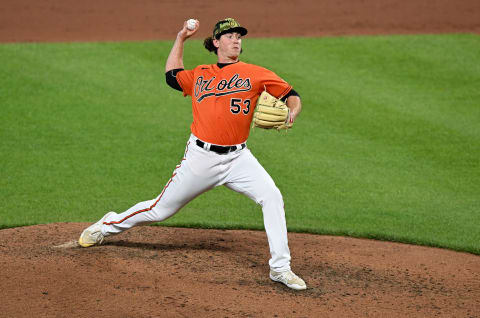 BALTIMORE, MARYLAND – MAY 21: Mike Baumann #53 of the Baltimore Orioles pitches against the Tampa Bay Rays at Oriole Park at Camden Yards on May 21, 2022, in Baltimore, Maryland. (Photo by G Fiume/Getty Images)