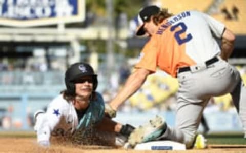 LOS ANGELES, CALIFORNIA – JULY 16: Zac Veen #9 of the National League steals third base against Gunnar Henderson #2 of the American League during the SiriusXM All-Star Futures Game at Dodger Stadium on July 16, 2022 in Los Angeles, California. (Photo by Kevork Djansezian/Getty Images)