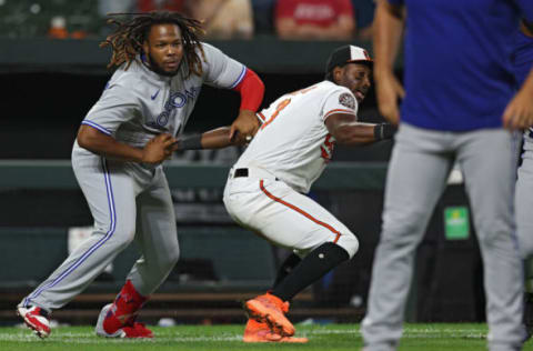 BALTIMORE, MARYLAND – SEPTEMBER 06: Vladimir Guerrero Jr. #27 of the Toronto Blue Jays looks on from the dugout against the Baltimore Orioles during the third inning at Oriole Park at Camden Yards on September 06, 2022 in Baltimore, Maryland. (Photo by Patrick Smith/Getty Images)