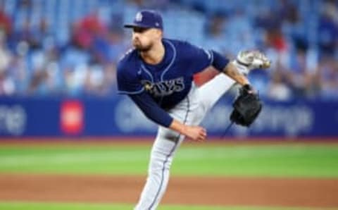 TORONTO, ON – SEPTEMBER 13: Shawn Armstrong #64 of the Tampa Bay Rays delivers a pitch during game one of a doubleheader against the Toronto Blue Jays at Rogers Centre on September 13, 2022 in Toronto, Ontario, Canada. (Photo by Vaughn Ridley/Getty Images)