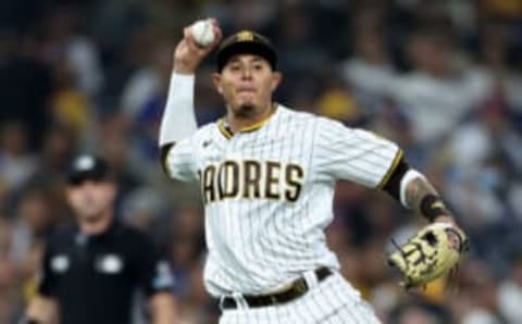 SAN DIEGO, CALIFORNIA – SEPTEMBER 29: Manny Machado #13 of the San Diego Padres throws to first base during a game against the Los Angeles Dodgers at PETCO Park on September 29, 2022 in San Diego, California. (Photo by Sean M. Haffey/Getty Images)