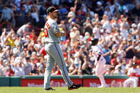 Bruce Zimmermann #50 of the Baltimore Orioles walks off the mound after giving up his fifth home run. (Photo By Winslow Townson/Getty Images)