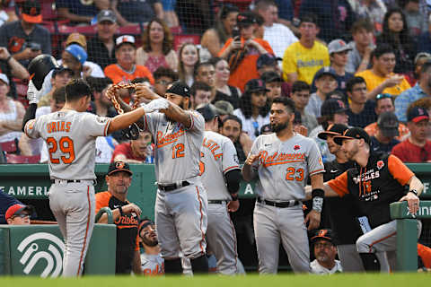 Rougned Odor #12 places a chain around Ramon Urias #29 of the Baltimore Orioles after hitting a two run home run. (Photo by Kathryn Riley/Getty Images)