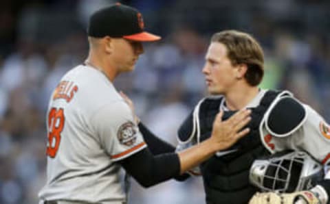 Adley Rutschman #35 and Tyler Wells #68 of the Baltimore Orioles. (Photo by Jim McIsaac/Getty Images)