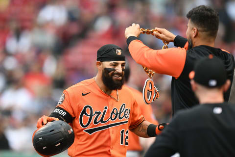 Baltimore Orioles second baseman Rougned Odor (12) receives a chain from a teammate after hitting three-run home run. Mandatory Credit: Brian Fluharty-USA TODAY Sports