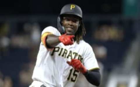 Aug 3, 2022; Pittsburgh, Pennsylvania, USA; Pittsburgh Pirates shortstop Oneil Cruz (15) gestures to the Pirates dugout as he circles the bases on a two run home run against the Milwaukee Brewers during the seventh inning at PNC Park. Mandatory Credit: Charles LeClaire-USA TODAY Sports