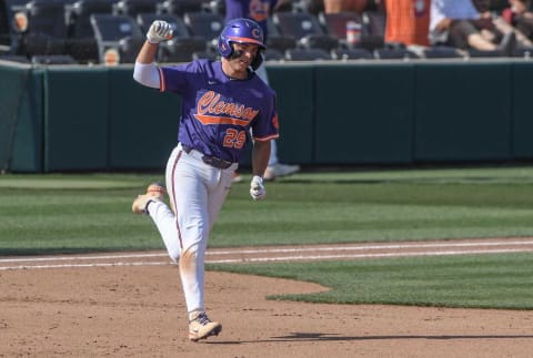 Clemson sophomore Max Wagner (29) hits a three run home run against Boston College during the bottom of the seventh inning at Doug Kingsmore Stadium in Clemson Friday, May 20, 2022.Clemson University Tigers Vs Boston College Ncaa Baseball