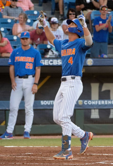 May 28, 2022; Hoover, AL, USA; Florida centerfielder Jud Fabian (4) crosses home plate, pointing heavenward after hitting a home run against Texas A&M in the SEC Tournament at the Hoover Met in Hoover, Ala., Saturday. Mandatory Credit: Gary Cosby Jr.-The Tuscaloosa NewsSports Sec Baseball Tournament Texas A M Vs Florida