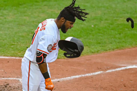 Sep 25, 2022; Baltimore, Maryland, USA; Baltimore Orioles center fielder Cedric Mullins (31) reacts after striking out with the bases loaded to end the eighth inning against the Houston Astros at Oriole Park at Camden Yards. Mandatory Credit: Tommy Gilligan-USA TODAY Sports