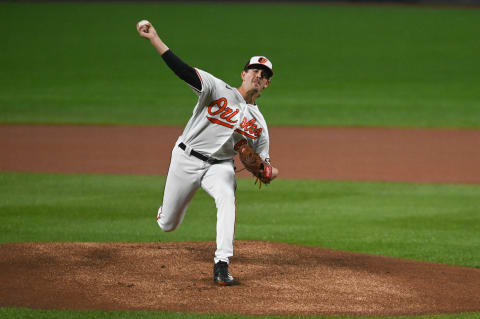 Oct 3, 2022; Baltimore, Maryland, USA; Baltimore Orioles starting pitcher Dean Kremer (64) throws a first inning pitch against the Toronto Blue Jays at Oriole Park at Camden Yards. Mandatory Credit: Tommy Gilligan-USA TODAY Sports