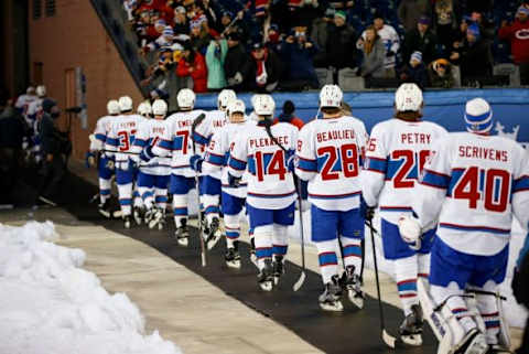 Jan 1, 2016; Foxborough, MA, USA; Montreal Canadiens walk off the ice after the Winter Classic hockey game against the Boston Bruins at Gillette Stadium. The Canadiens beat the Bruins 5-1. Mandatory Credit: Greg M. Cooper-USA TODAY Sports