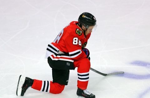 Mar 20, 2016; Chicago, IL, USA; Chicago Blackhawks right wing Patrick Kane (88) reacts after colliding with Minnesota Wild defenseman Matt Dumba (not pictured) during the third period at the United Center. Minnesota won 3-2 in a shoot out. Mandatory Credit: Dennis Wierzbicki-USA TODAY Sports