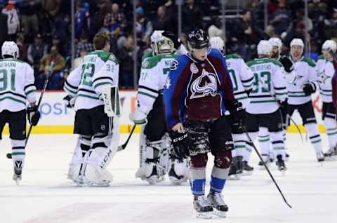 Feb 4, 2016; Denver, CO, USA; Colorado Avalanche defenseman Tyson Barrie (4) reacts after giving up the puck to Dallas Stars defenseman John Klingberg (not pictured) to lose the game in a overtime period at the Pepsi Center. The Stars defeated the Avalanche in overtime 4-3. Mandatory Credit: Ron Chenoy-USA TODAY Sports