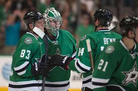 Apr 7, 2016; Dallas, TX, USA; Dallas Stars right wing Ales Hemsky (83), goalie Kari Lehtonen (32), and left wing Jamie Benn (14) celebrate after defeating the Colorado Avalanche 4-2 at the American Airlines Center. Mandatory Credit: Jerome Miron-USA TODAY Sports