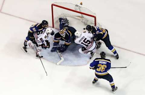 Apr 21, 2016; St. Louis, MO, USA; Chicago Blackhawks center Artem Anisimov (15) scores a goal past St. Louis Blues goalie Brian Elliott (1) during the second period in game five of the first round of the 2016 Stanley Cup Playoffs at Scottrade Center. Mandatory Credit: Billy Hurst-USA TODAY Sports