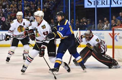 Apr 13, 2016; St. Louis, MO, USA; St. Louis Blues left wing Jaden Schwartz (17) and Chicago Blackhawks defenseman Viktor Svedberg (43) fight for position on the ice during the second period in game one of the first round of the 2016 Stanley Cup Playoffs at Scottrade Center. Mandatory Credit: Jasen Vinlove-USA TODAY Sports