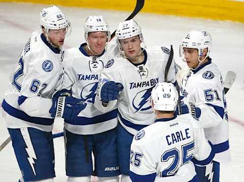 Apr 9, 2016; Montreal, Quebec, CAN; Tampa Bay Lightning left wing Jonathan Drouin (27) celebrates with teammates after scoring a goal against the Montreal Canadiens during the third period at Bell Centre. Mandatory Credit: Jean-Yves Ahern-USA TODAY Sports