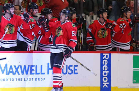 Apr 23, 2016; Chicago, IL, USA; Chicago Blackhawks defenseman Trevor van Riemsdyk (57) is congratulated for scoring a goal during the second period in game six of the first round of the 2016 Stanley Cup Playoffs against the St. Louis Blues at the United Center. Mandatory Credit: Dennis Wierzbicki-USA TODAY Sports