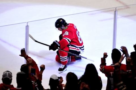 Apr 3, 2016; Chicago, IL, USA; Chicago Blackhawks right wing Patrick Kane (88) celebrates his third goal of the game against the Boston Bruins during the second period at the United Center. Mandatory Credit: David Banks-USA TODAY Sports