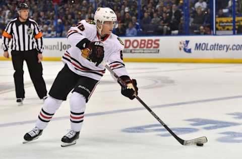 Apr 13, 2016; St. Louis, MO, USA; Chicago Blackhawks right wing Patrick Kane (88) skates with the puck against the St. Louis Blues during the first period in game one of the first round of the 2016 Stanley Cup Playoffs at Scottrade Center. Mandatory Credit: Jasen Vinlove-USA TODAY Sports