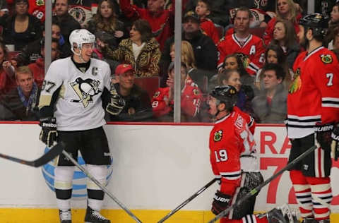 Feb 15, 2015; Chicago, IL, USA; Pittsburgh Penguins center Sidney Crosby (87) reacts to being called for a tripping penalty against Chicago Blackhawks center Jonathan Toews (19) during the third period at the United Center. The Blackhawks won 2-1 in a shoot out. Mandatory Credit: Dennis Wierzbicki-USA TODAY Sports