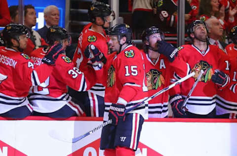 Apr 17, 2016; Chicago, IL, USA; Chicago Blackhawks center Artem Anisimov (15) is congratulated for scoring a goal during the second period in game three of the first round of the 2016 Stanley Cup Playoffs against the St. Louis Blues at the United Center. Mandatory Credit: Dennis Wierzbicki-USA TODAY Sports