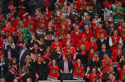 Apr 23, 2016; Chicago, IL, USA; Chicago Blackhawks fans celebrate during the third period in game six of the first round of the 2016 Stanley Cup Playoffs against the St. Louis Blues at the United Center. Chicago won 6-3. Mandatory Credit: Dennis Wierzbicki-USA TODAY Sports