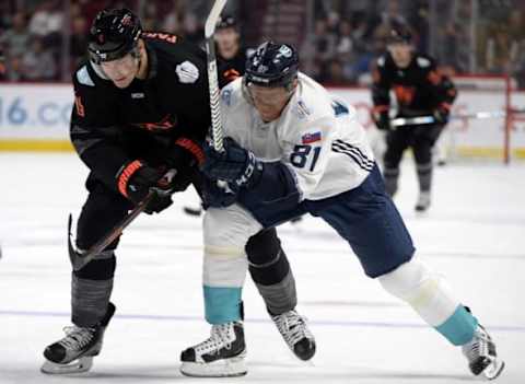 Sep 11, 2016; Montreal, Quebec, Canada; Team North America defenseman Colton Parayko (4) and Team Europe forward Marian Hossa (81) battle for the puck in the first period during a World Cup of Hockey pre-tournament game at the Bell Centre. Mandatory Credit: Eric Bolte-USA TODAY Sports