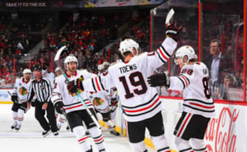 OTTAWA, ON – OCTOBER 4: Patrick Kane #88 of the Chicago Blackhawks celebrates with teammate Jonathan Toews #19 after scoring an overtime goal on the Ottawa Senators at Canadian Tire Centre on October 4, 2018 in Ottawa, Ontario, Canada. (Photo by Andrea Cardin/NHLI via Getty Images)