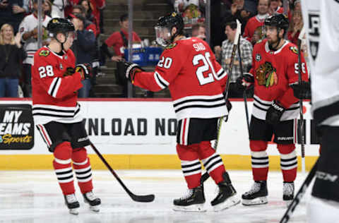 CHICAGO, IL – NOVEMBER 16: Brandon Saad #20 of the Chicago Blackhawks reacts with Henri Jokiharju #28 after scoring against the Los Angeles Kings in the third period at the United Center on November 16, 2018 in Chicago, Illinois. (Photo by Bill Smith/NHLI via Getty Images)