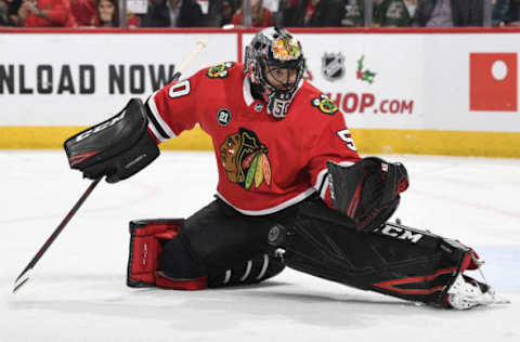 CHICAGO, IL – DECEMBER 14: Goalie Corey Crawford #50 of the Chicago Blackhawks gets in position to stop the puck in the second period against the Winnipeg Jets at the United Center on December 14, 2018 in Chicago, Illinois. (Photo by Bill Smith/NHLI via Getty Images)