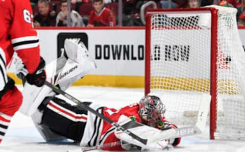 CHICAGO, IL – DECEMBER 23: The Florida Panthers get the puck past goalie Cam Ward #30 of the Chicago Blackhawks in the second period at the United Center on December 23, 2018 in Chicago, Illinois. (Photo by Bill Smith/NHLI via Getty Images)