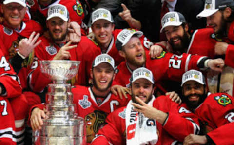 CHICAGO, IL – JUNE 15: The Chicago Blackhawks pose with the Stanley Cup after defeating the Tampa Bay Lightning 2-0 in Game Six to win the 2015 NHL Stanley Cup Final at the United Center on June 15, 2015 in Chicago, Illinois. (Photo by Dave Sandford/NHLI via Getty Images)