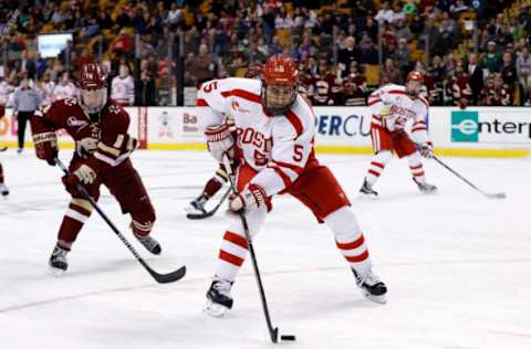 BOSTON, MA – MARCH 17: Boston University Terriers defenseman Chad Krys (5) chased by Boston College Eagles defenseman Jesper Mattila (8) during a Hockey East semifinal between the Boston University Terriers and the Boston College Eagles on March 17, 2017 at TD Garden in Boston, Massachusetts. The Eagles defeated the Terriers 3-2. (Photo by Fred Kfoury III/Icon Sportswire via Getty Images)