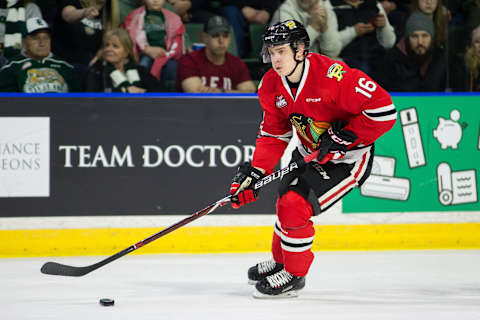 EVERETT, WA – APRIL 13: Defenseman Henri Jokiharju (16) of the Portland Winterhawks skates the puck out of the defensive zone during the first period in Game 5 of the second round of the Western Hockey League playoffs between the Everett Silvertips and Portland Winterhawks on Friday, April 13, 2018 at Angel of the Winds Arena in Everett, WA. The Everett Silvertips won the game by a final score of 4-0. (Photo by Christopher Mast/Icon Sportswire via Getty Images)