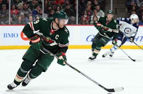 ST. PAUL, MN – JANUARY 13: Minnesota Wild Center Mikko Koivu (9) skates with the puck during a NHL game between the Minnesota Wild and Winnipeg Jets on January 13, 2018 at Xcel Energy Center in St. Paul, MN. The Wild defeated the Jets 4-1.(Photo by Nick Wosika/Icon Sportswire via Getty Images)