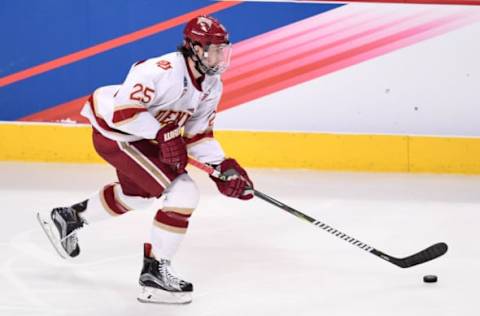 CHICAGO, IL – APRIL 06: Denver Pioneers defenseman Blake Hillman (25) controls the puck in the second period of an NCAA Frozen Four semifinal game with the Denver Pioneers and the Notre Dame Fighting Irish on April 6, 2017, at the United Center in Chicago, IL. (Photo by Patrick Gorski/Icon Sportswire via Getty Images)